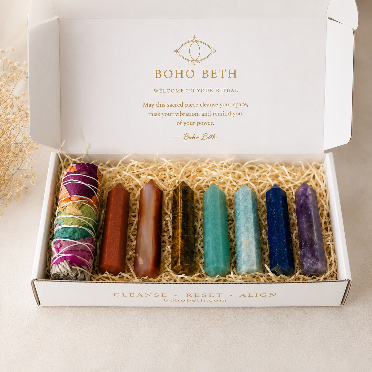 Chakra sage smudge kit with seven colourful crystal points including Red Jasper, Carnelian, Tiger’s Eye and Amethyst.