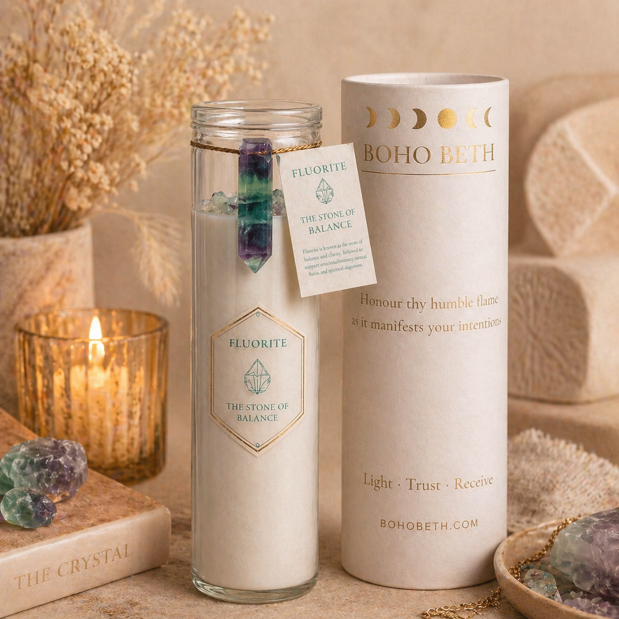 Boho Beth fluorite balance candle with crystal charm and luxury cream and gold packaging, styled in a calming neutral setting for clarity and spiritual rituals