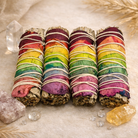 Boho Beth chakra smudge stick with sage bundle surrounded by crystals for chakra balancing and home energy cleansing decor