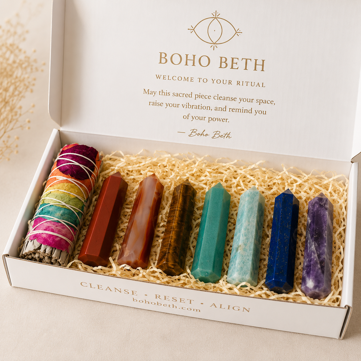 Chakra crystal smudge kit featuring seven crystal points and chakra sage presented in a Boho Beth ritual box.