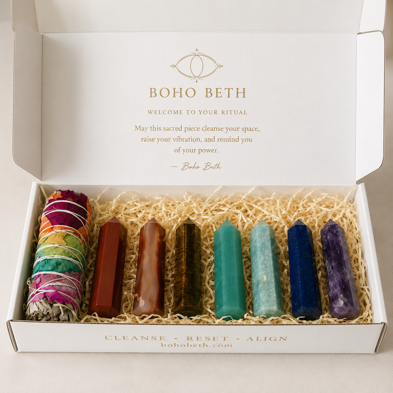 Boho Beth chakra smudge kit with seven chakra crystal points and colourful sage bundle in a luxury ritual gift box.