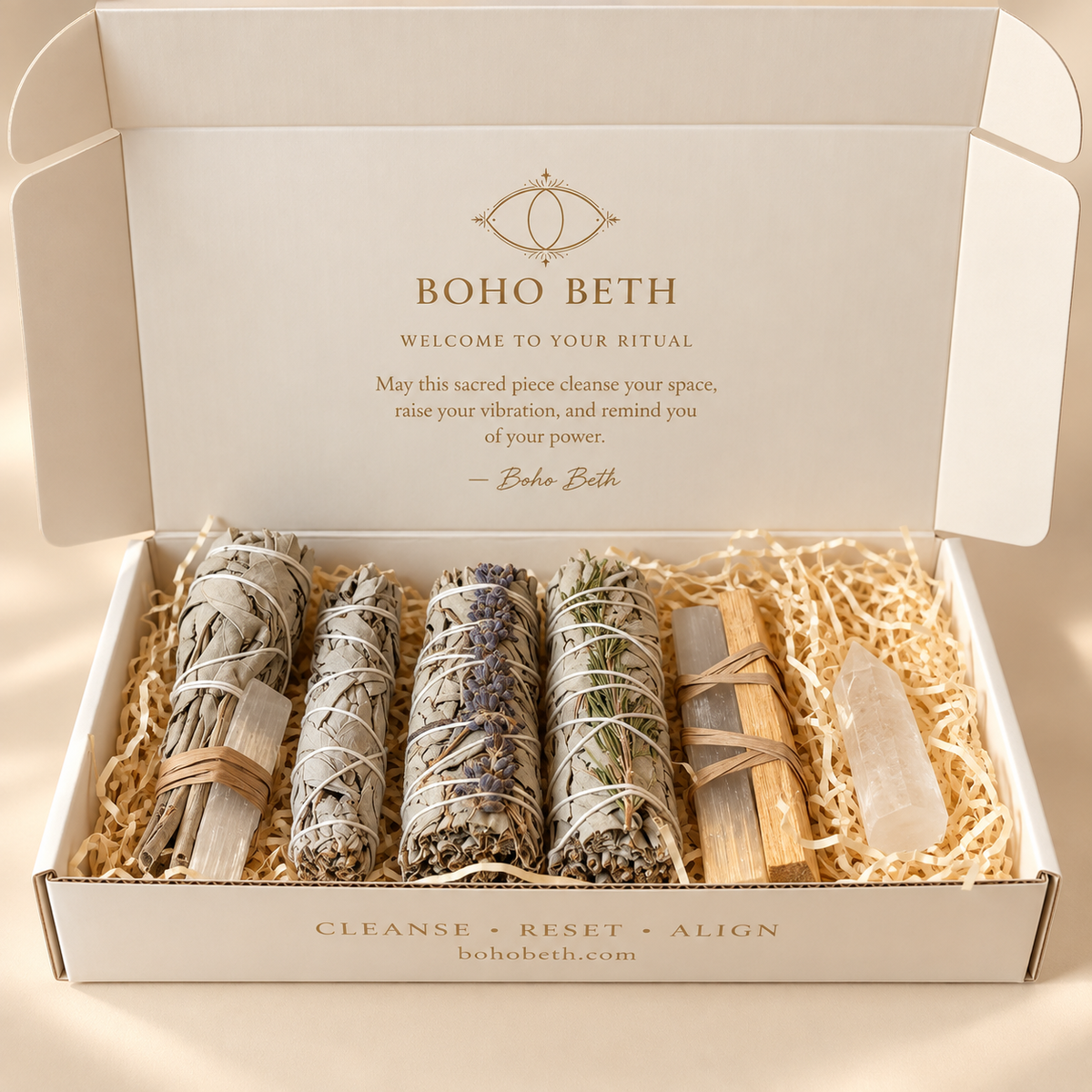 Luxury spiritual cleansing gift box containing sage bundles, Palo Santo, selenite and clear quartz